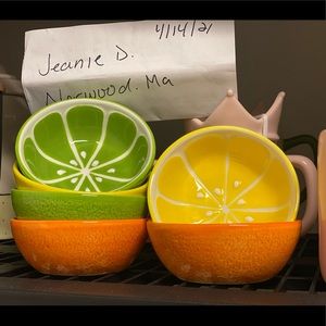 Orange,lime,lemon bowls